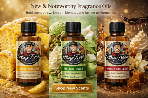 Three bottles of 'Stay Fresh' fragrance oils with different scents on a decorative background.