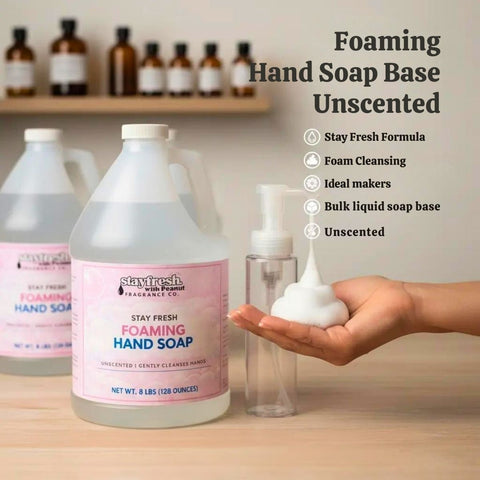 Foaming hand soap base with packaging and a person holding a pump dispenser.